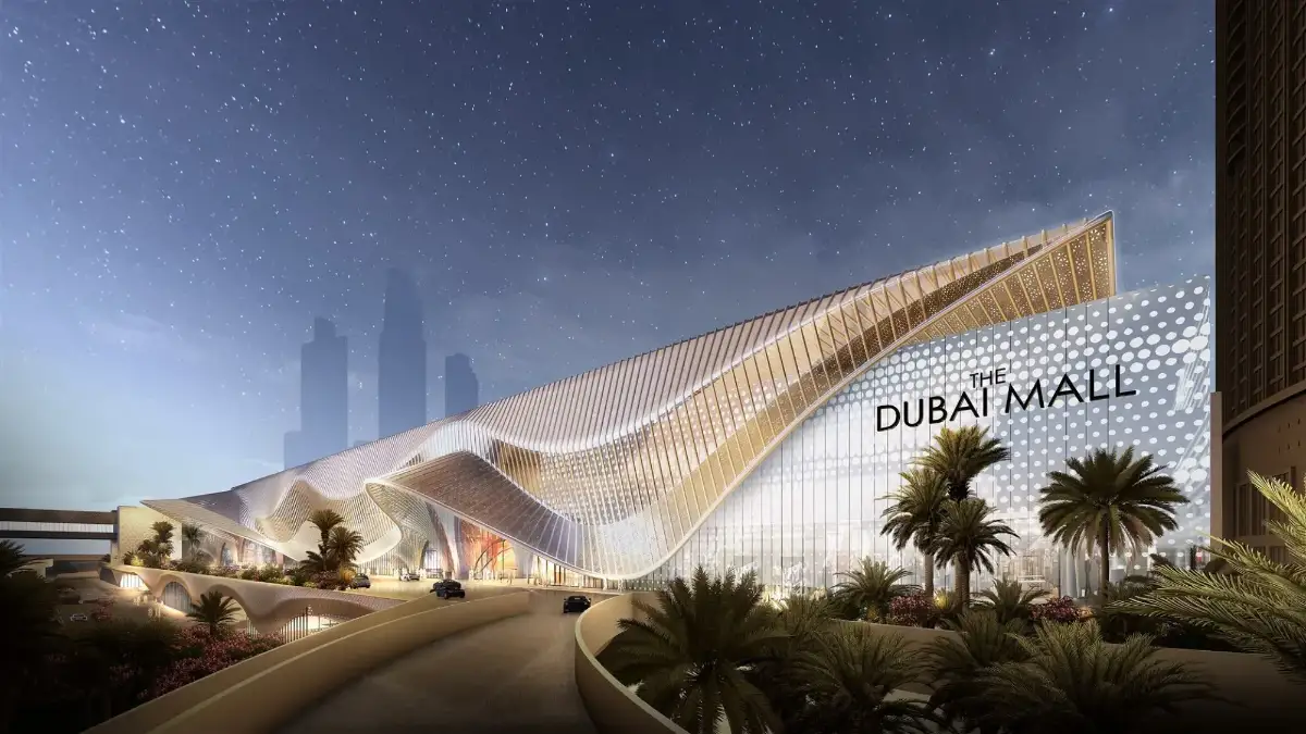 L'aspetto esterno del Dubai Mall con architettura moderna e vetrata durante il giorno.